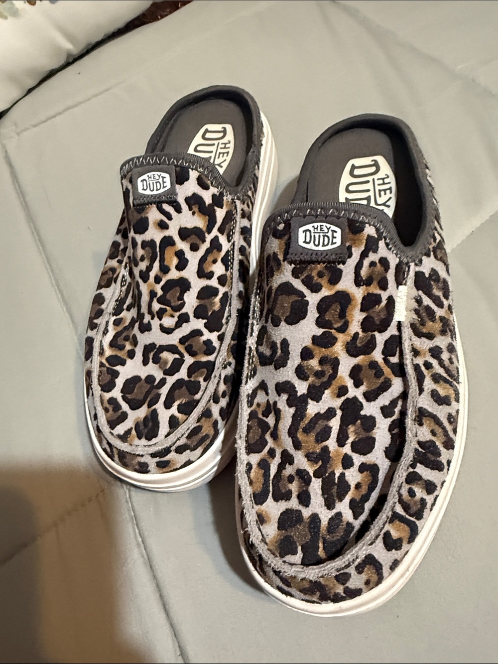 Hey Dude Women's Leopard Print Slip-On Mules in Brown and Black